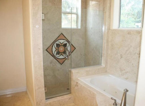 Unique bathroom with jacuzzi and shower by HT Constructions, Los Angeles, CA