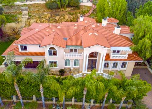 Custom Built Home front yard aerial view in Los Angeles by HT Constructions 