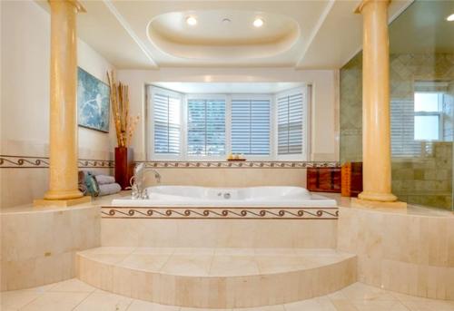 Custom bathroom designs with jacuzzi by HT Constructions, Los Angeles, CA